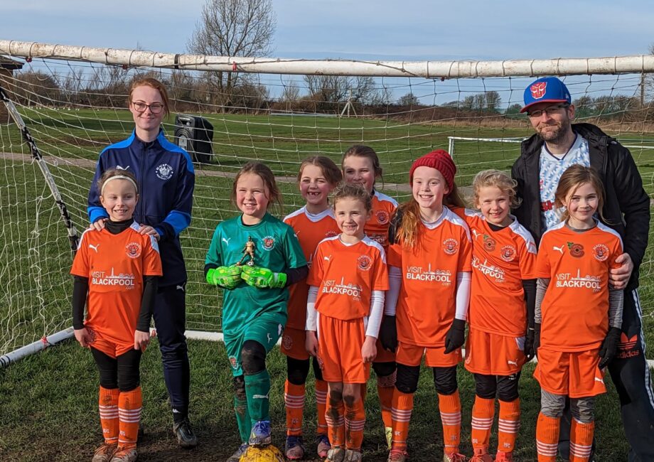 Blackpool FC's under 8s girls' football team sponsored by Barker Booth & Eastwood